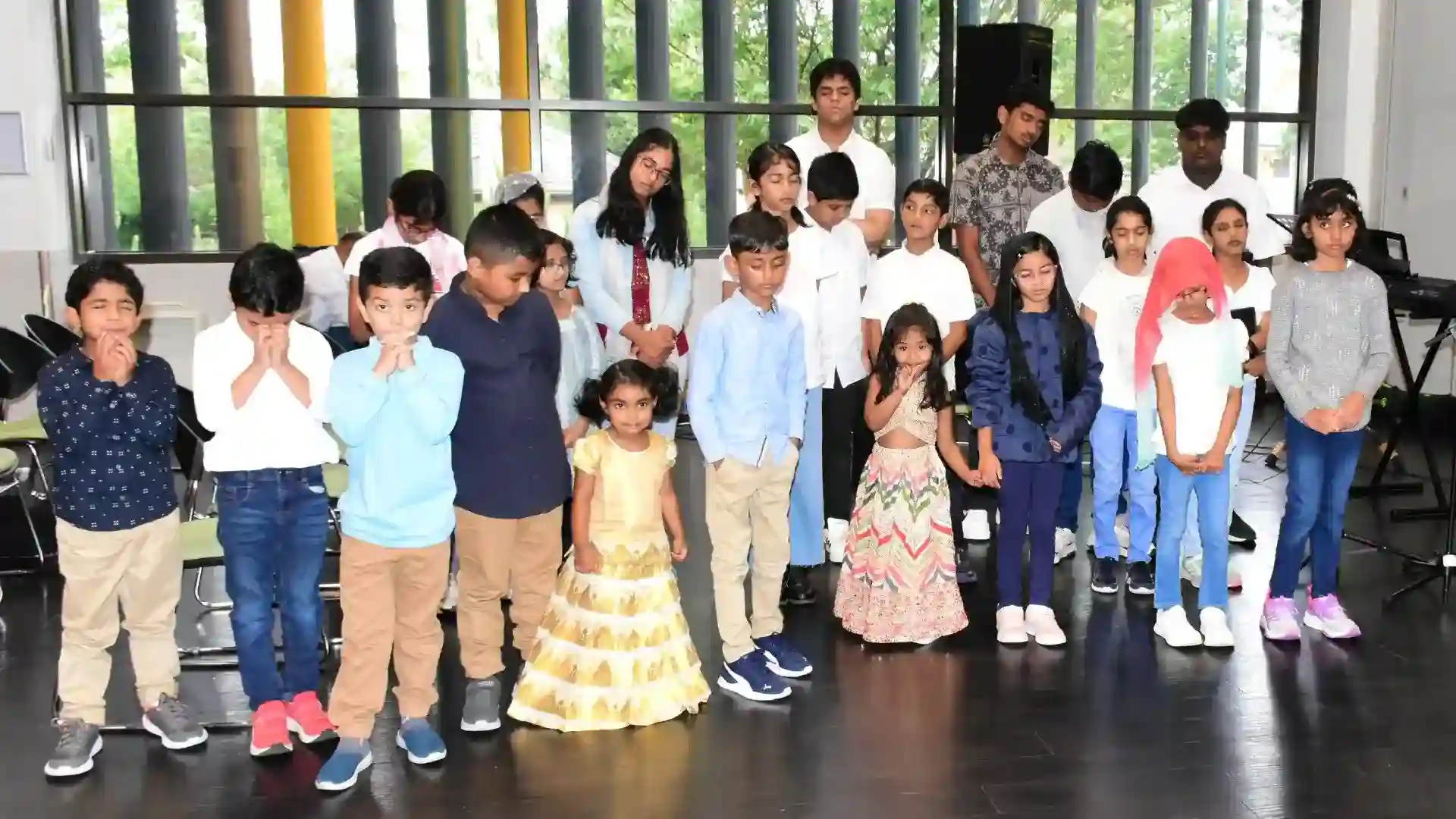 Kids doing prayer in Philadelphia church Lynbrook